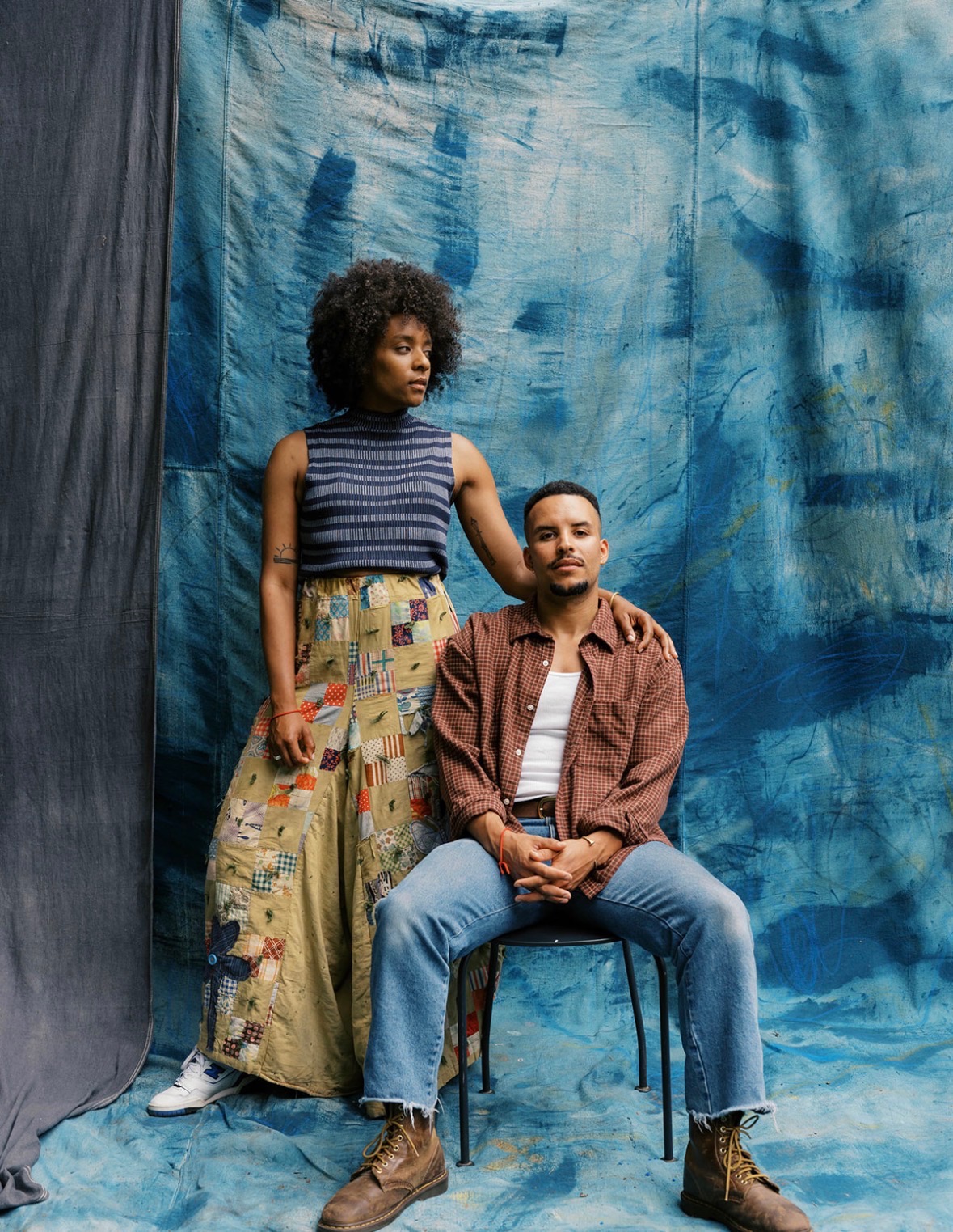 Tavior Mowry seated with Zandy standing beside him