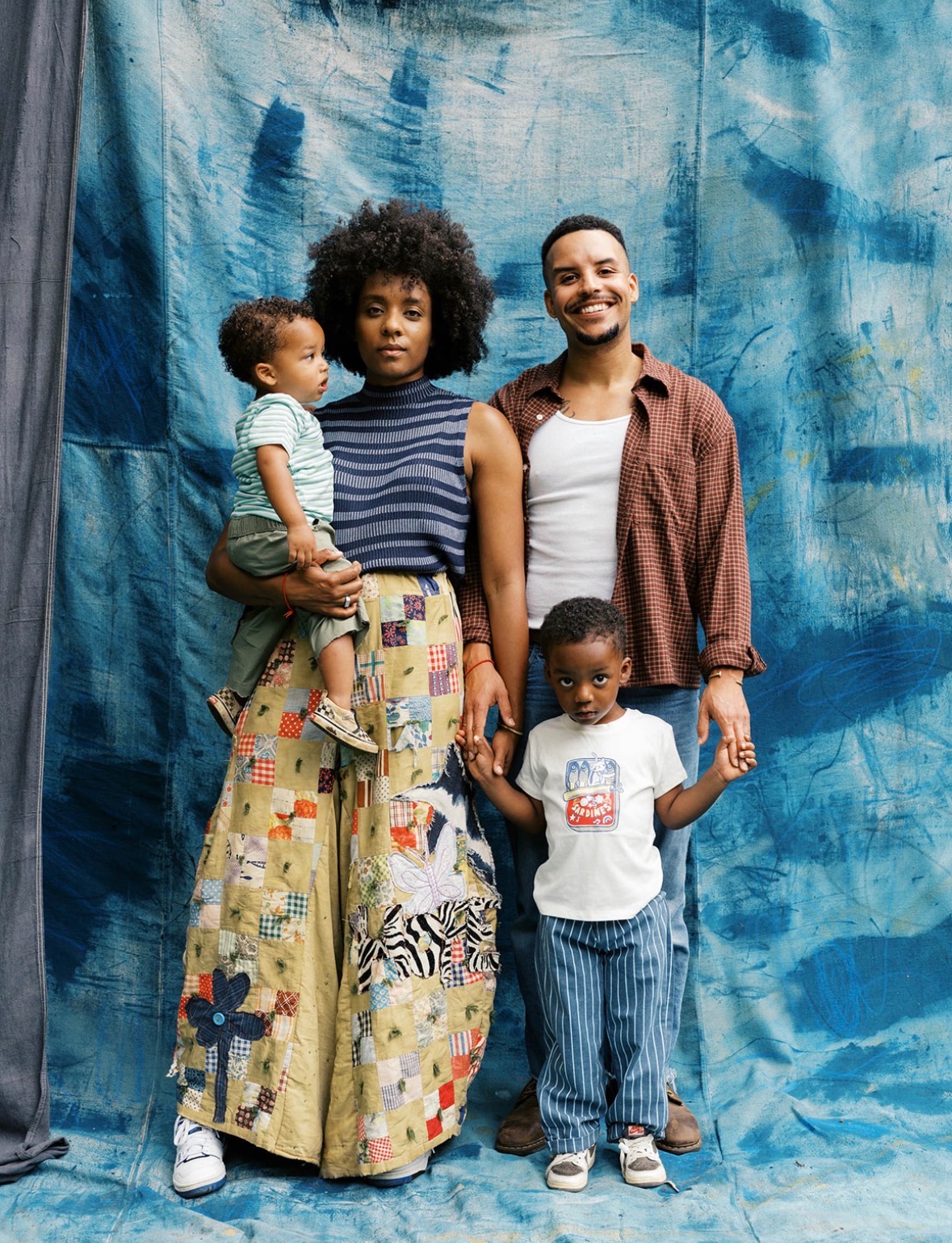 The Mowry family portrait with their two young sons